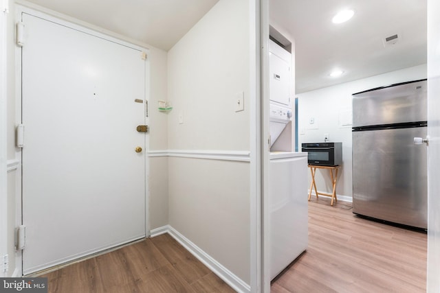 1413 Northgate Sq Unit 13/2A, Reston, VA 20190 - doorway featuring light wood finished floors and recessed lighting