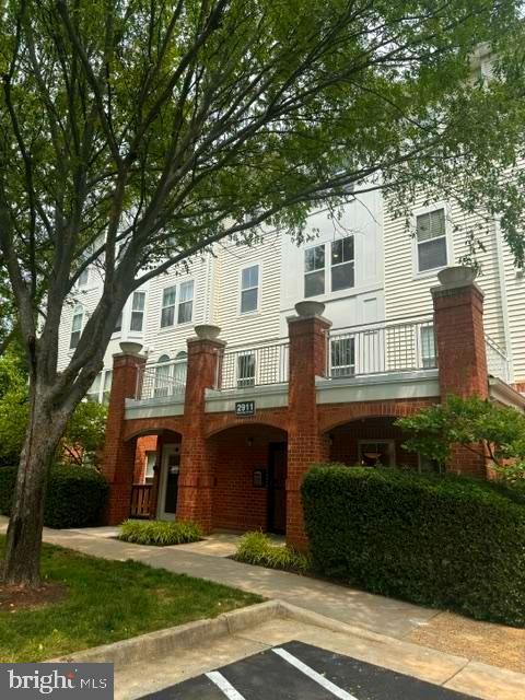 2911 Deer Hollow Way Unit 423, Fairfax, VA 22031 - view of building exterior with uncovered parking