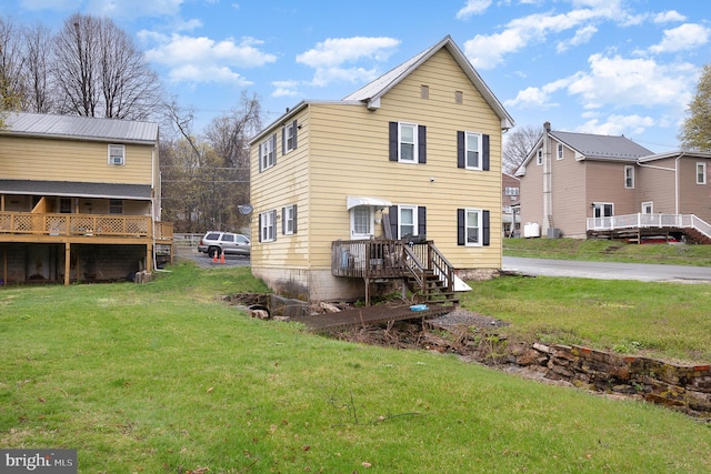 17 Clark St, Duncannon, PA 17020 - rear view of house with a yard and a wooden deck