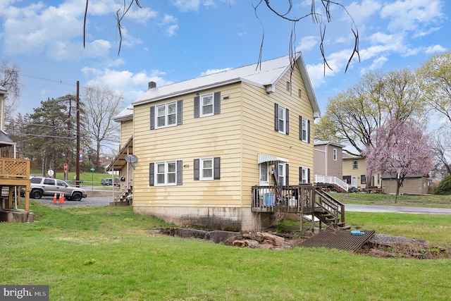 17 Clark St, Duncannon, PA 17020 - view of property exterior with a lawn, a chimney, and stairway