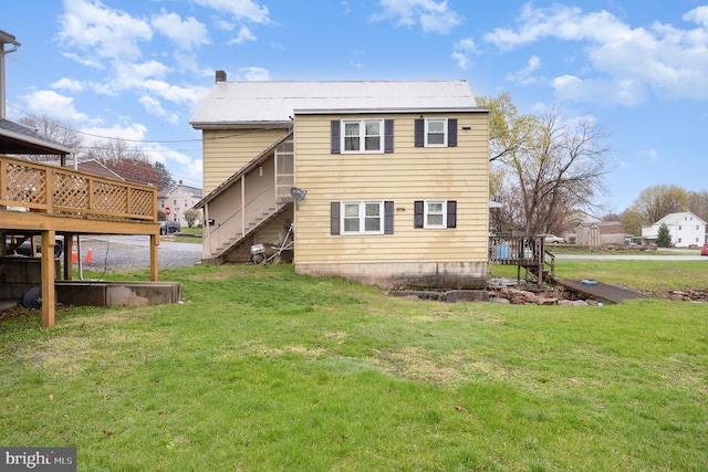 17 Clark St, Duncannon, PA 17020 - back of property featuring stairway, a deck, and a lawn