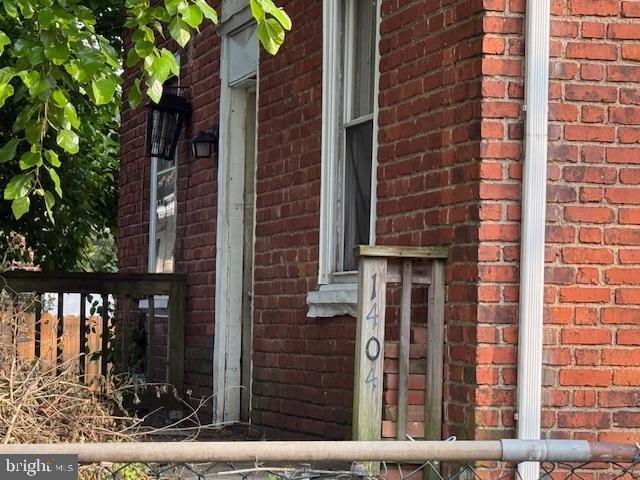 1404 Roanoke Rd, Camden, NJ 08104 - view of side of home featuring brick siding