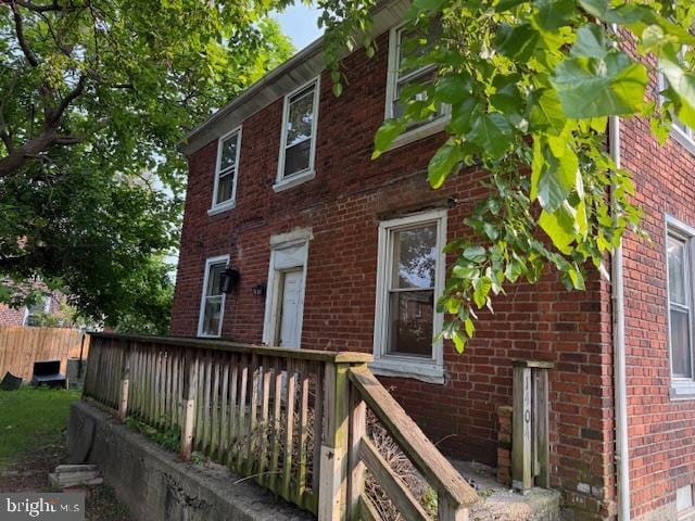 1404 Roanoke Rd, Camden, NJ 08104 - view of property exterior featuring brick siding and a deck