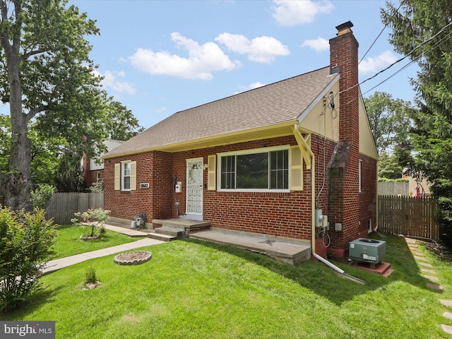 10602 Edgewood Ave, Silver Spring, MD 20901 - bungalow with a chimney, brick siding, and a shingled roof