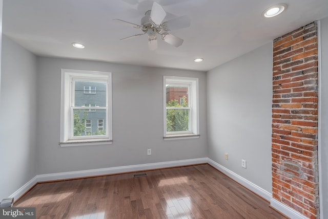 518 Scott St, Baltimore, MD 21230 - spare room featuring wood finished floors, baseboards, ceiling fan, and recessed lighting