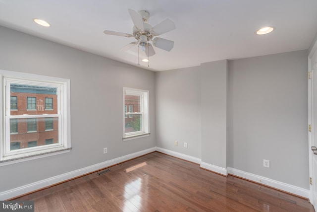 518 Scott St, Baltimore, MD 21230 - spare room featuring baseboards, wood finished floors, a ceiling fan, and recessed lighting