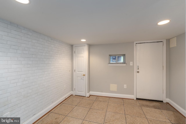 518 Scott St, Baltimore, MD 21230 - finished below grade area featuring brick wall, recessed lighting, and baseboards