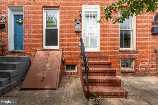 518 Scott St, Baltimore, MD 21230 - doorway to property featuring brick siding