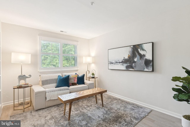 2900 Shipmaster Way Unit 211, Annapolis, MD 21401 - living room with wood finished floors and baseboards