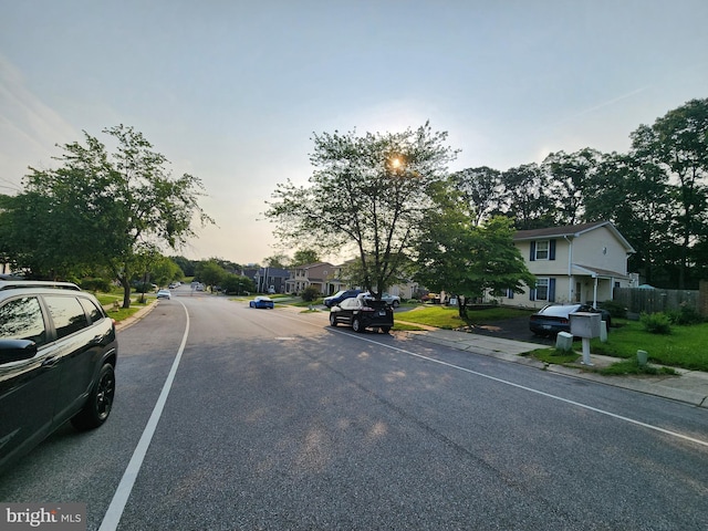 3486 Marble Arch Dr, Pasadena, MD 21122 - view of asphalt road with a residential view, curbs, and sidewalks