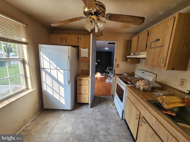 3486 Marble Arch Dr, Pasadena, MD 21122 - kitchen with white appliances, under cabinet range hood, a textured ceiling, ceiling fan, and a sink