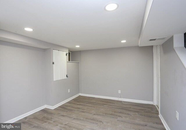 1932 Inverton Rd, Baltimore, MD 21222 - finished basement featuring wood finished floors and recessed lighting