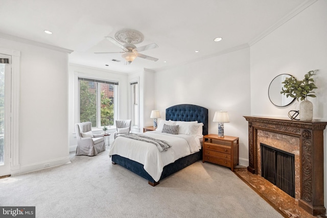 1827 Phelps Pl NW, Washington, DC 20008 - carpeted bedroom featuring ornamental molding, baseboards, recessed lighting, ceiling fan, and a high end fireplace