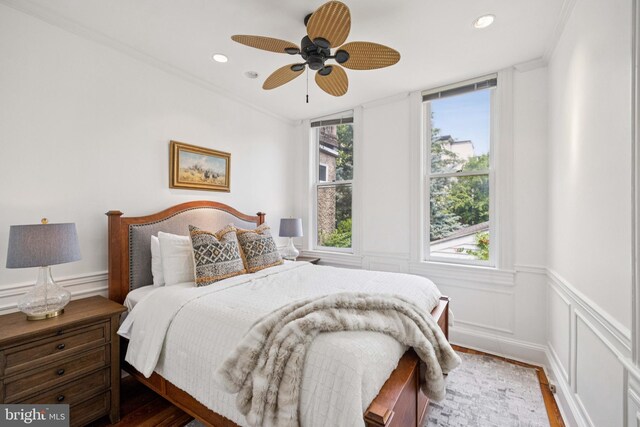 1827 Phelps Pl NW, Washington, DC 20008 - bedroom with wood finished floors, wainscoting, recessed lighting, a ceiling fan, and ornamental molding