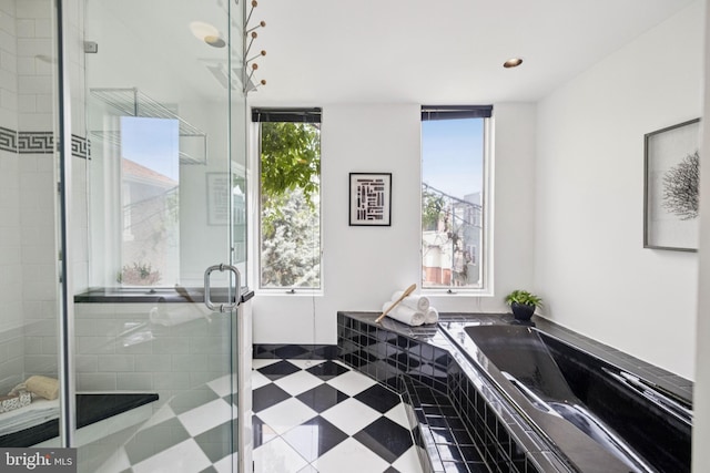 1827 Phelps Pl NW, Washington, DC 20008 - bathroom with a garden tub, a stall shower, and tile patterned floors