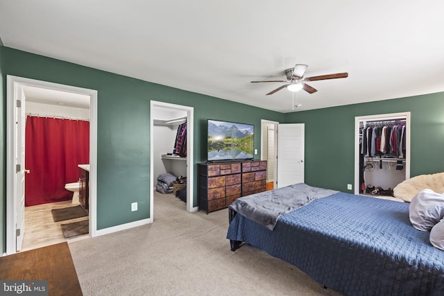 23170 Longview Blvd, Bushwood, MD 20618 - bedroom featuring a spacious closet, a closet, carpet floors, and ensuite bathroom