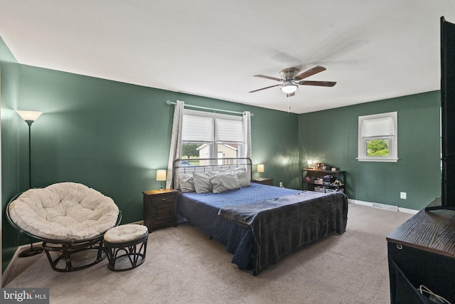 23170 Longview Blvd, Bushwood, MD 20618 - carpeted bedroom with multiple windows, ceiling fan, and baseboards
