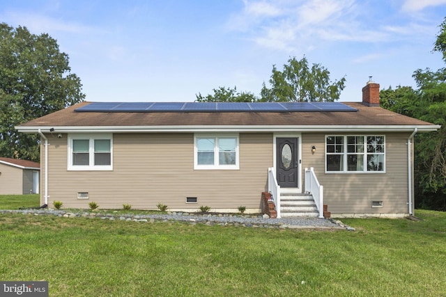 23170 Longview Blvd, Bushwood, MD 20618 - view of front of home featuring entry steps, a front lawn, a chimney, crawl space, and roof mounted solar panels