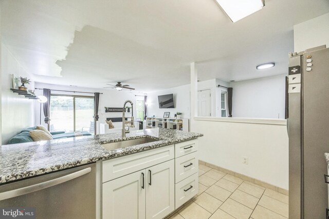 315 Coventry Ct, Mantua, NJ 08051 - kitchen with a sink, appliances with stainless steel finishes, a ceiling fan, white cabinetry, and open floor plan
