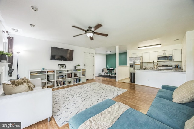 315 Coventry Ct, Mantua, NJ 08051 - living room featuring ceiling fan and wood finished floors