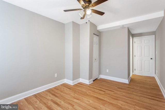 706 Cumberland St, Baltimore, MD 21217 - unfurnished bedroom with baseboards, light wood-style floors, and a ceiling fan