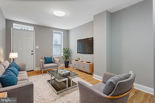 706 Cumberland St, Baltimore, MD 21217 - living area with light wood-style floors and baseboards
