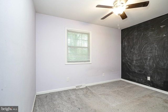 650 Penns Grove Auburn Rd, Carneys Point, NJ 08069 - carpeted empty room with a ceiling fan and baseboards