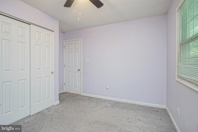 650 Penns Grove Auburn Rd, Carneys Point, NJ 08069 - unfurnished bedroom featuring carpet floors, a closet, ceiling fan, and multiple windows