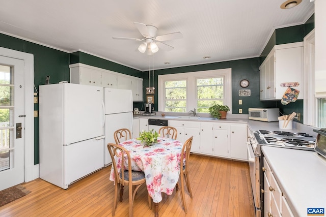 1362 Fortunes Cove Ln, Lovingston, VA 22949 - kitchen featuring white appliances, a ceiling fan, ornamental molding, white cabinets, and light wood-style flooring