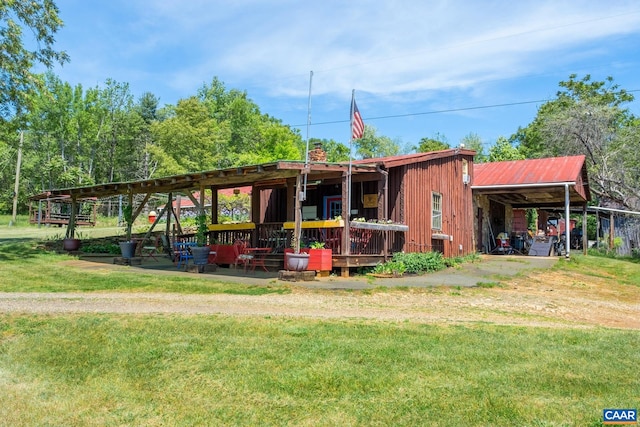 1362 Fortunes Cove Ln, Lovingston, VA 22949 - exterior space with a chimney, a yard, and an attached carport