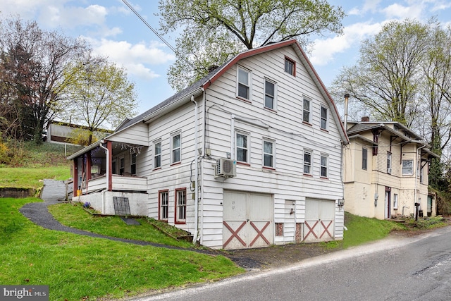 15-17 Locust St, Duncannon, PA 17020 - view of side of property featuring a yard, a garage, and driveway