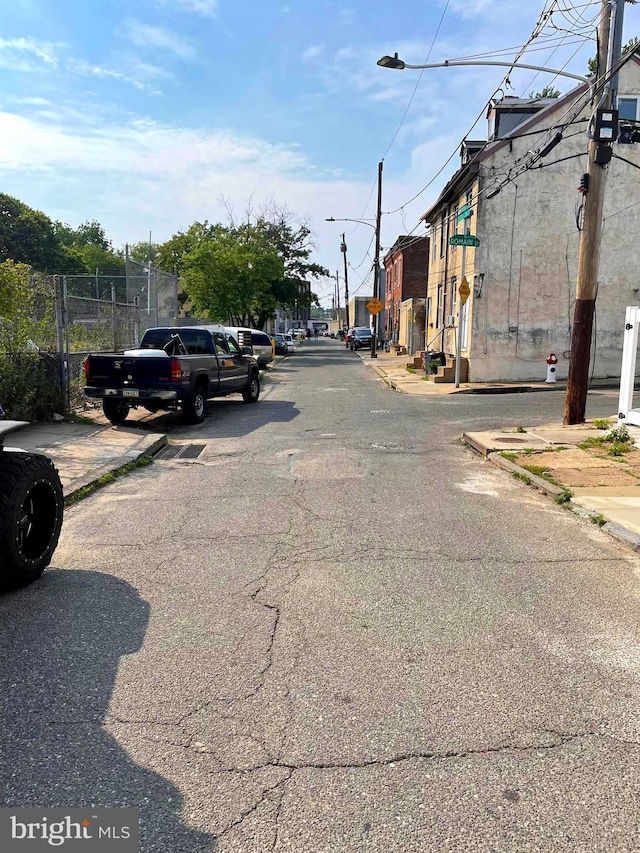 1531 Deal St, Philadelphia, PA 19124 - view of asphalt road with curbs, sidewalks, and street lights