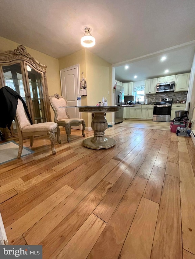 1531 Deal St, Philadelphia, PA 19124 - dining area with light wood-style floors and recessed lighting