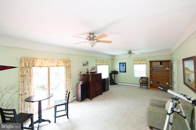 36 Algonquin Rd, Cambridge, MD 21613 - living area with light colored carpet, a ceiling fan, and ornamental molding