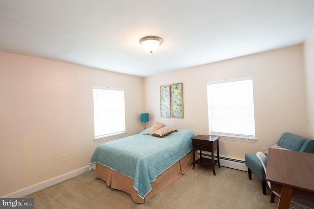 36 Algonquin Rd, Cambridge, MD 21613 - bedroom with a baseboard radiator, multiple windows, and carpet floors