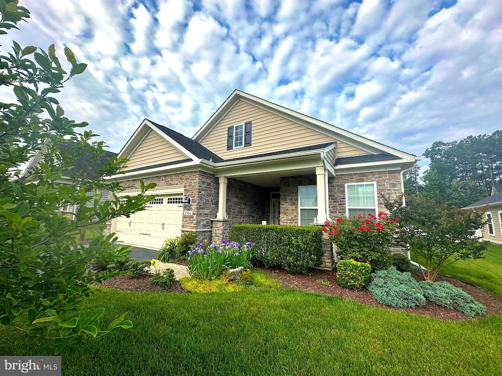 5906 New Berne Rd, Fredericksburg, VA 22407 - view of front of home featuring a front yard, an attached garage, and stone siding