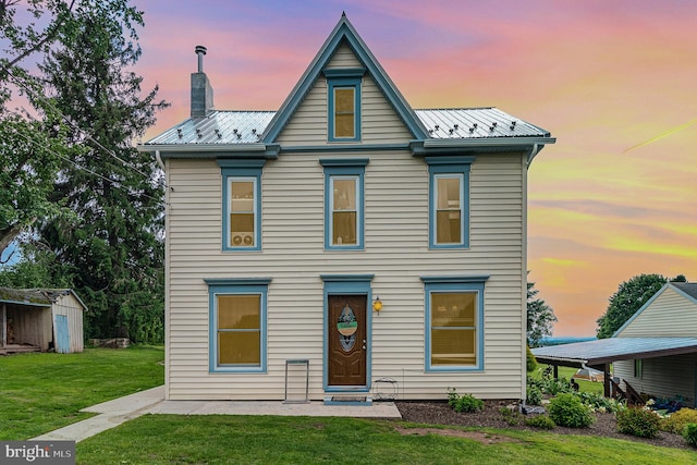 28 Laudermilch Rd, Halifax, PA 17032 - view of front of property featuring a front lawn, a chimney, and metal roof