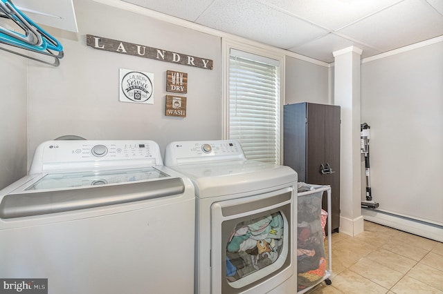 28 Laudermilch Rd, Halifax, PA 17032 - laundry room with washing machine and dryer, light tile patterned floors, and baseboard heating