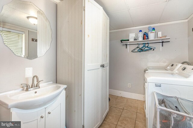 28 Laudermilch Rd, Halifax, PA 17032 - laundry room with washing machine and clothes dryer, light tile patterned floors, and baseboards