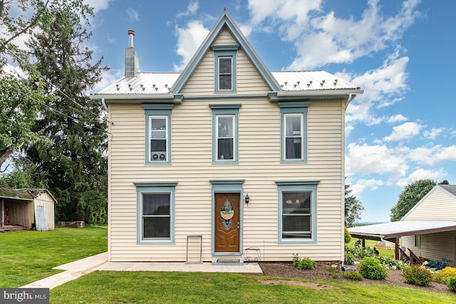 28 Laudermilch Rd, Halifax, PA 17032 - view of front of property with a front yard, metal roof, and a chimney