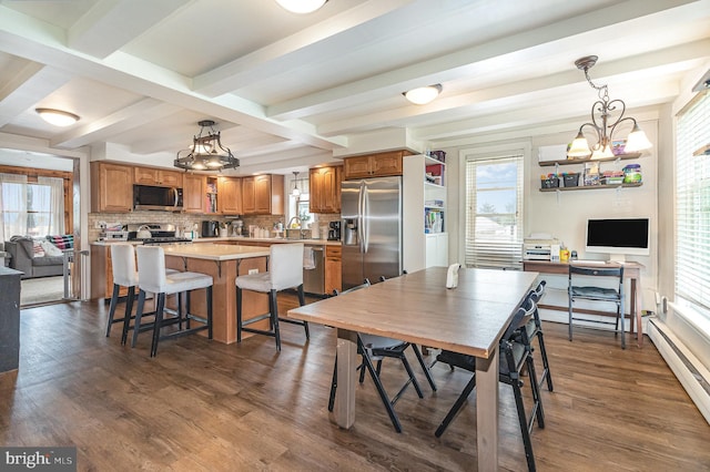 28 Laudermilch Rd, Halifax, PA 17032 - dining space with a baseboard heating unit, dark wood-type flooring, a chandelier, healthy amount of natural light, and beamed ceiling