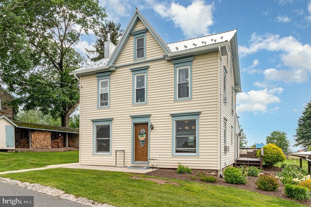 28 Laudermilch Rd, Halifax, PA 17032 - view of front of home featuring a front yard and metal roof