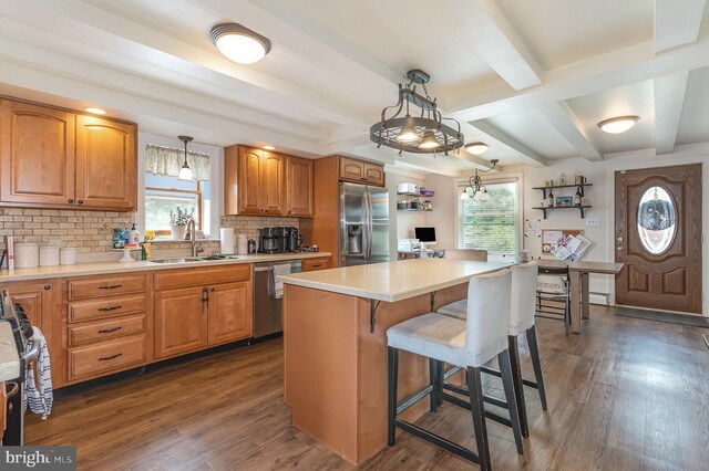 28 Laudermilch Rd, Halifax, PA 17032 - kitchen featuring a sink, appliances with stainless steel finishes, dark wood-type flooring, tasteful backsplash, and beamed ceiling