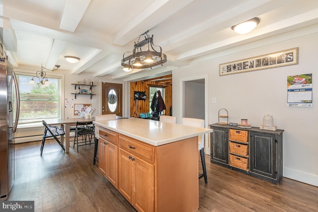 28 Laudermilch Rd, Halifax, PA 17032 - kitchen with a kitchen bar, dark wood-style floors, light countertops, a center island, and beamed ceiling