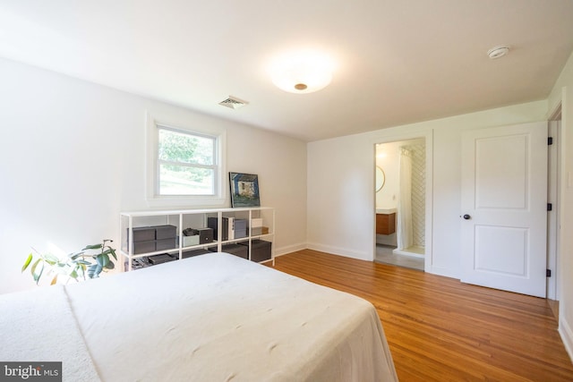 549 E Lafayette Dr, West Chester, PA 19382 - bedroom featuring wood finished floors and connected bathroom