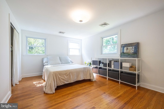549 E Lafayette Dr, West Chester, PA 19382 - bedroom with light wood finished floors and multiple windows