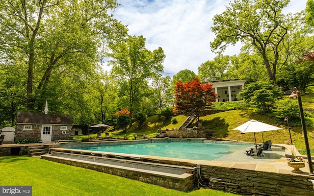 11 Conshohocken State Rd, Gladwyne, PA 19035 - swimming pool with an outdoor structure, a patio, a yard, and view of scattered trees