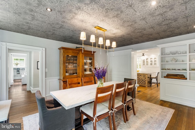 11 Conshohocken State Rd, Gladwyne, PA 19035 - dining space featuring dark wood-type flooring and a wainscoted wall