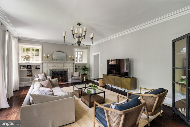 11 Conshohocken State Rd, Gladwyne, PA 19035 - living area featuring crown molding, a chandelier, a high end fireplace, hardwood / wood-style flooring, and baseboards