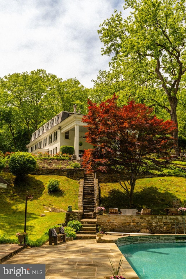 11 Conshohocken State Rd, Gladwyne, PA 19035 - swimming pool featuring stairway, a yard, and a patio